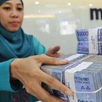 Pelemahan Ekonomi Global Bikin Laba Bank Mandiri Merosot 32 Persen
